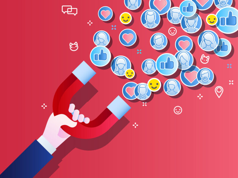 Concept of attracting followers, customers and clients to business. Hand holding magnet on blue background. Vector illustration in flat style.